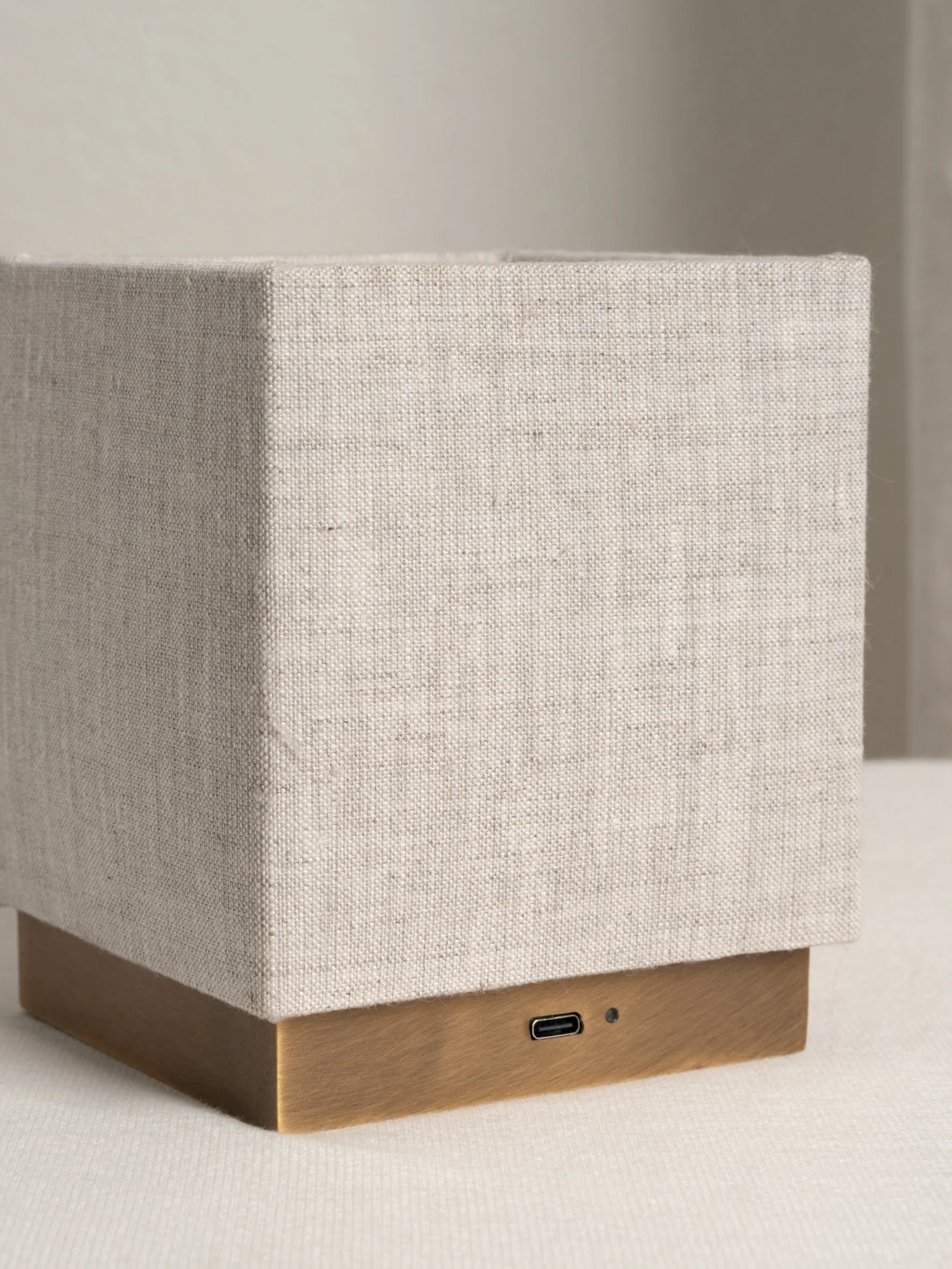 Cube - aged brass and linen rechargeable table lamp