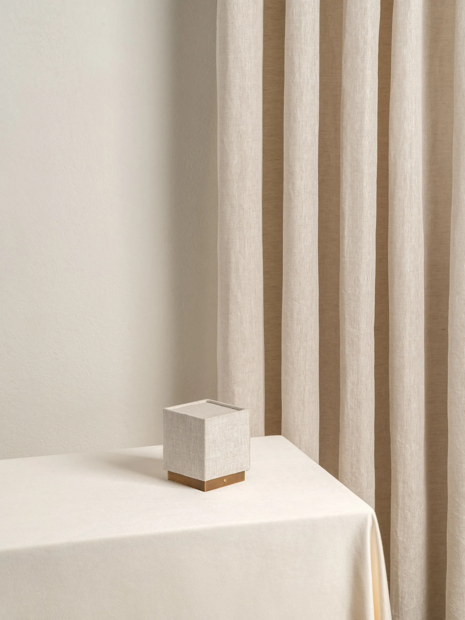 Cube - aged brass and linen rechargeable table lamp