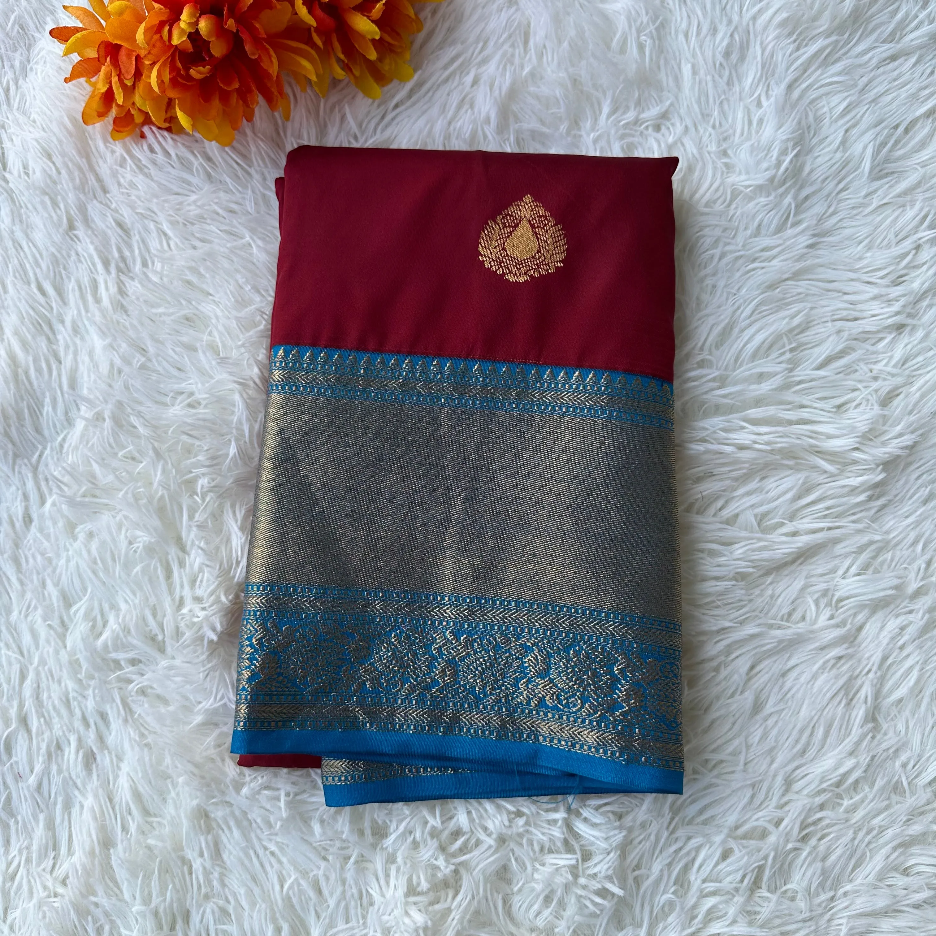 The Emerald Maron Semi Silk Saree With Contrast Sky Blue Border