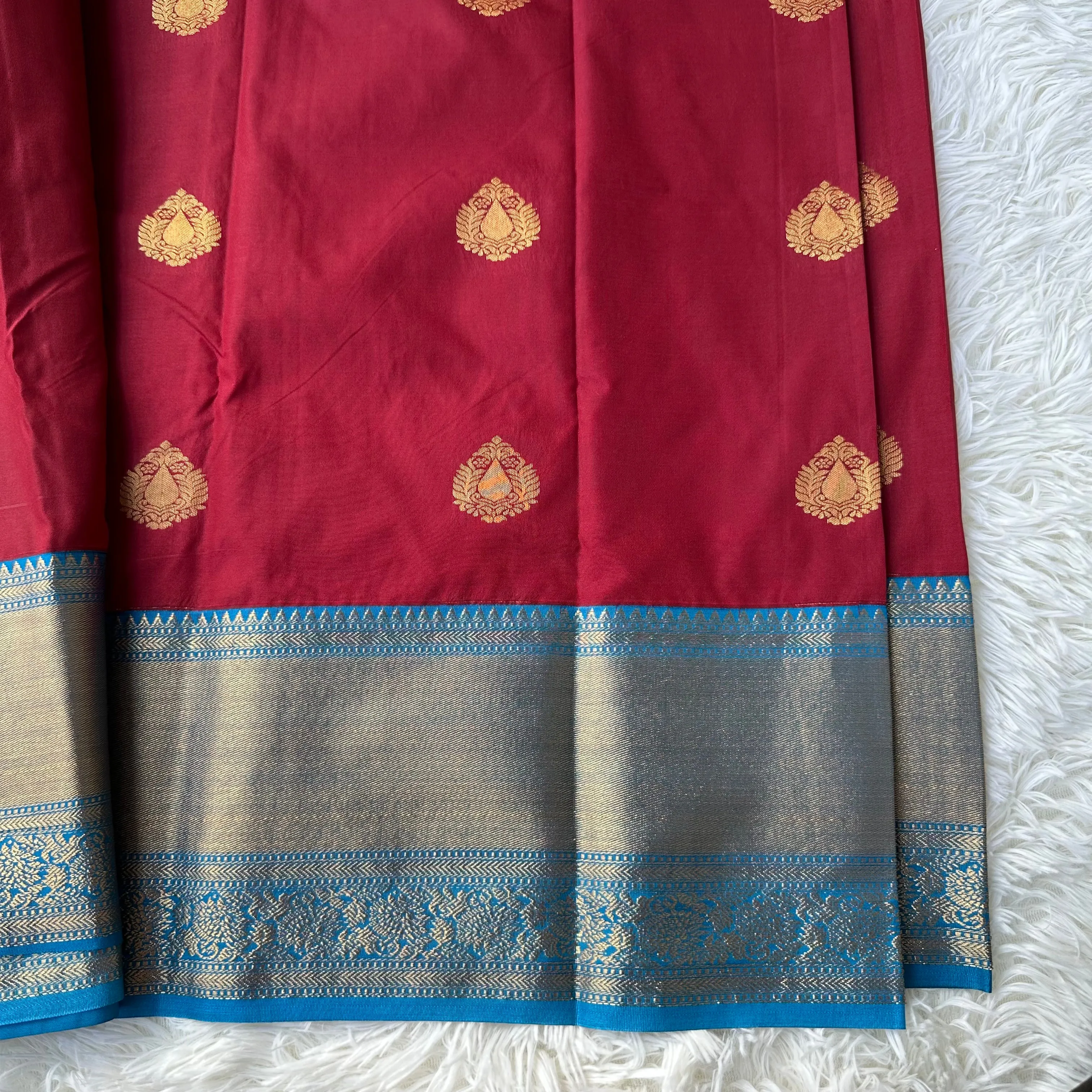 The Emerald Maron Semi Silk Saree With Contrast Sky Blue Border