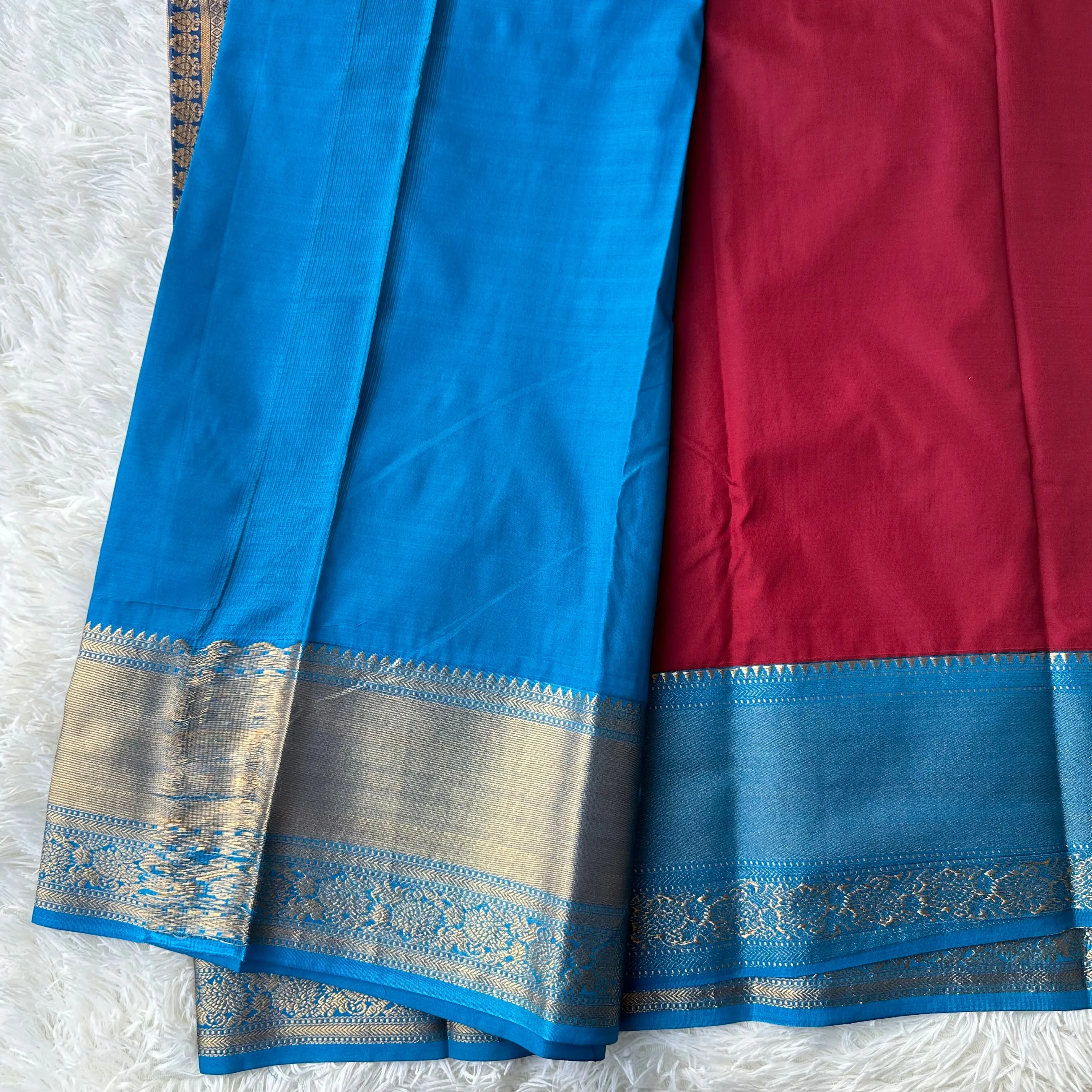 The Emerald Maron Semi Silk Saree With Contrast Sky Blue Border