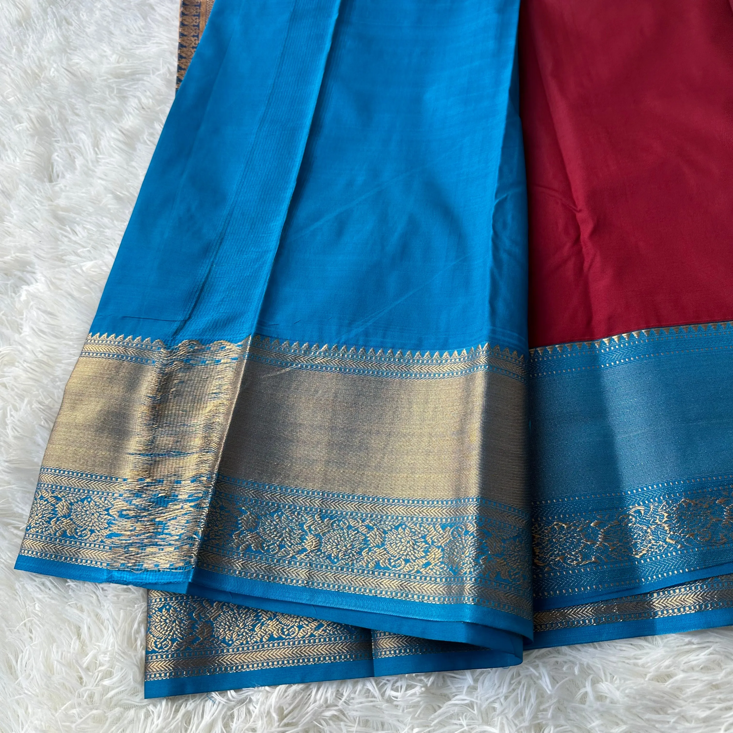 The Emerald Maron Semi Silk Saree With Contrast Sky Blue Border