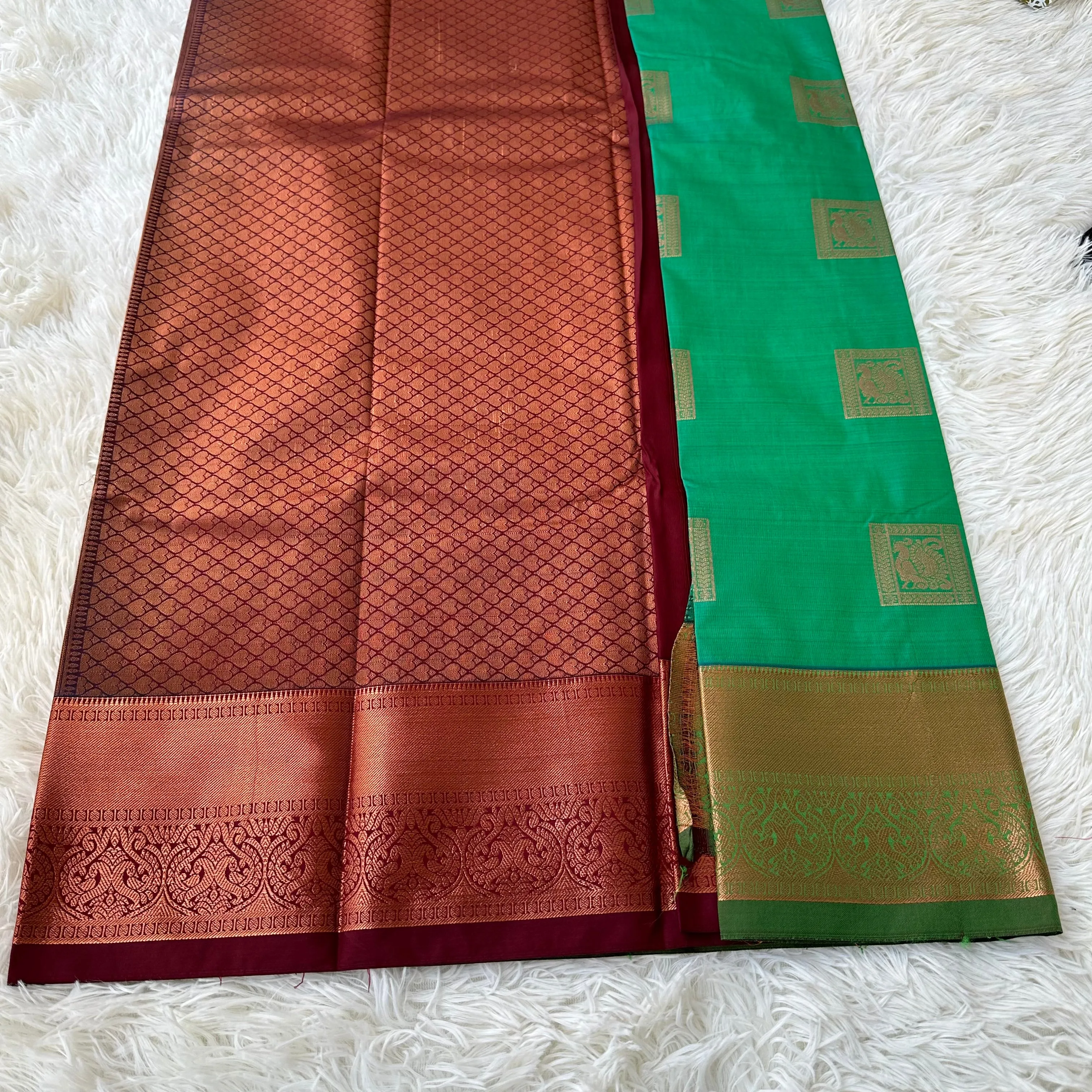 The Harmony Emerald Green Semi Silk Saree  With Meroon Border