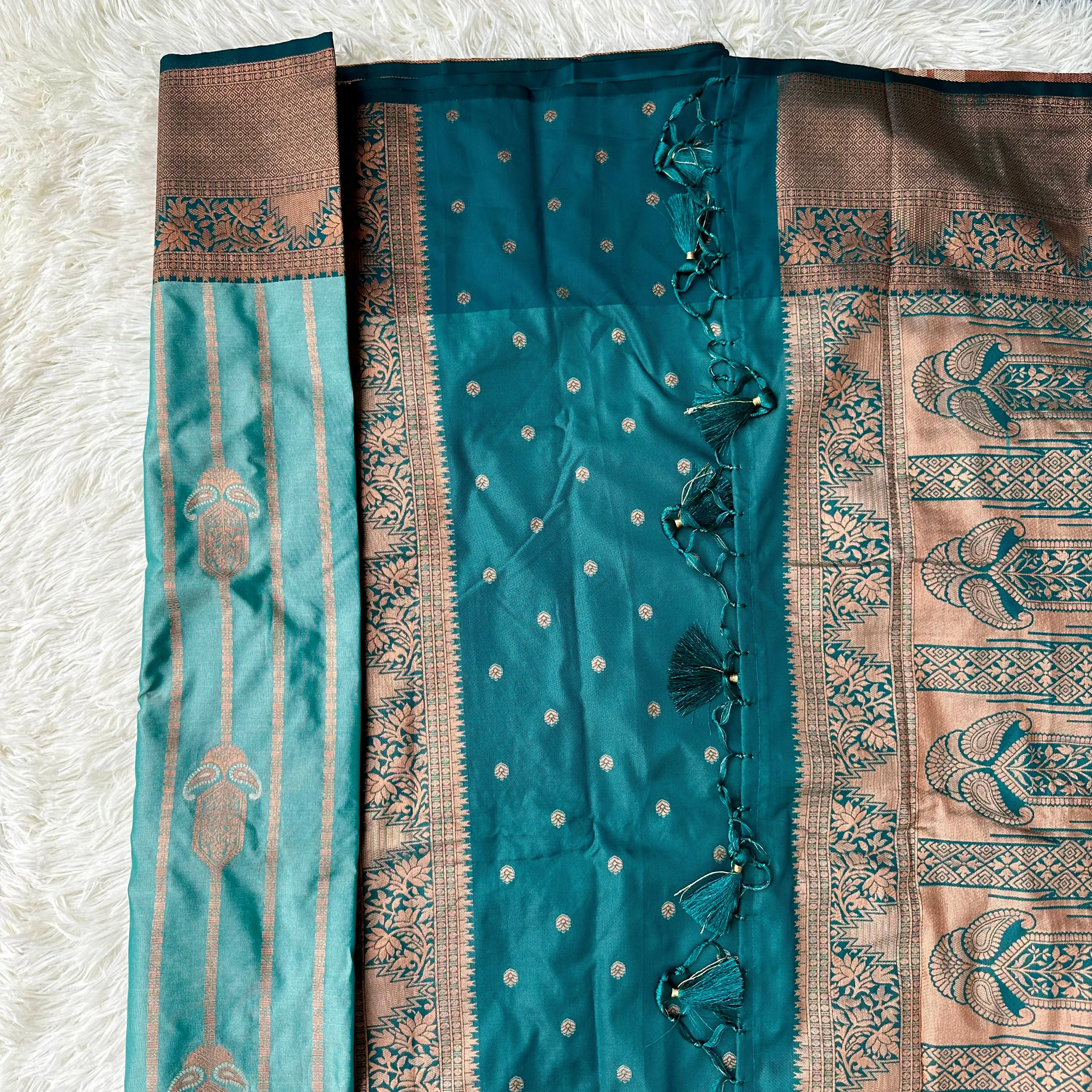 Turquoise Tranquility: Copper Zari Weaved Semi Silk Saree