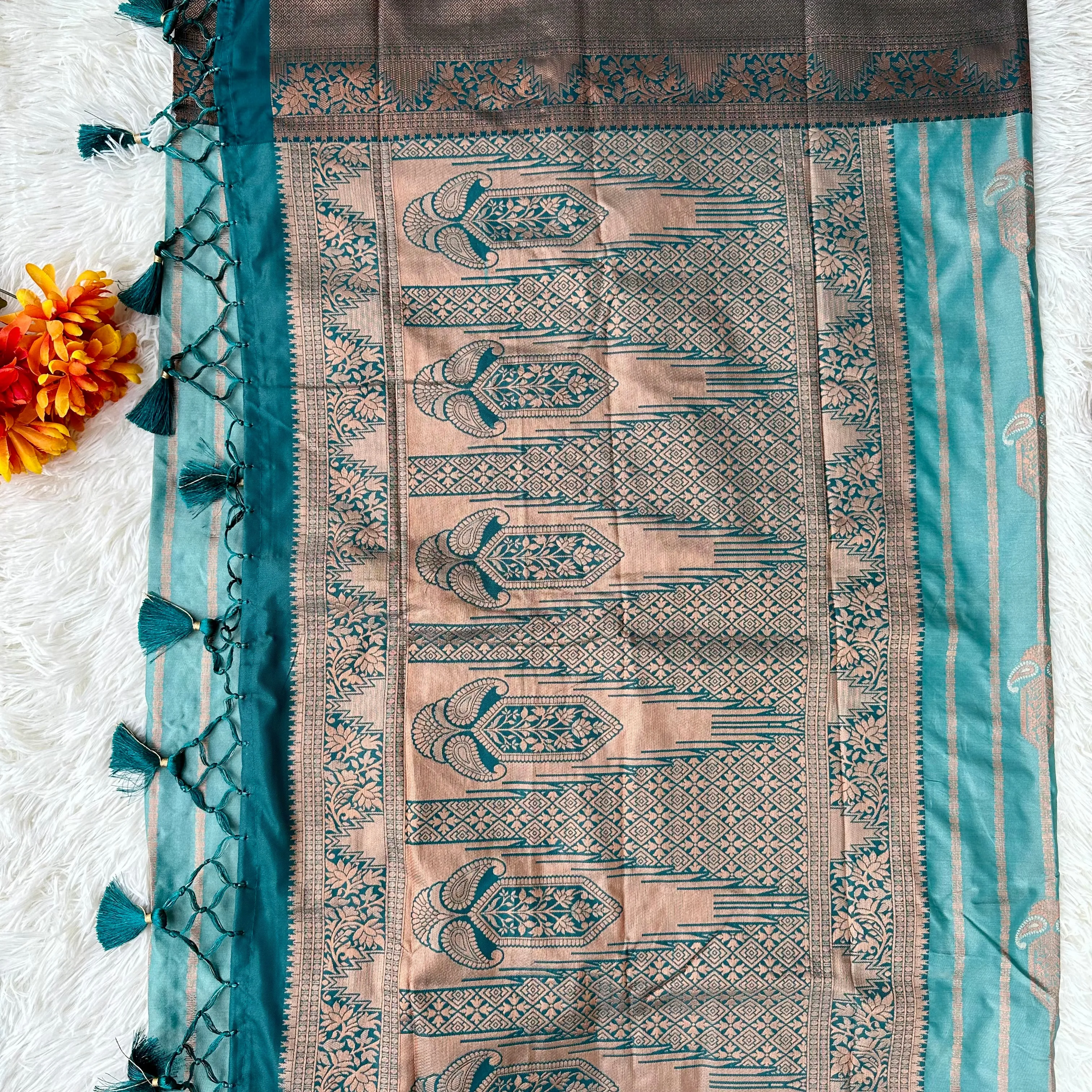 Turquoise Tranquility: Copper Zari Weaved Semi Silk Saree